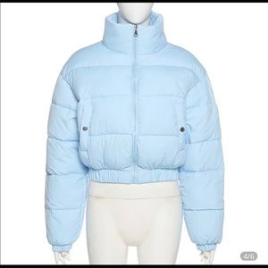 A blue puffer coat